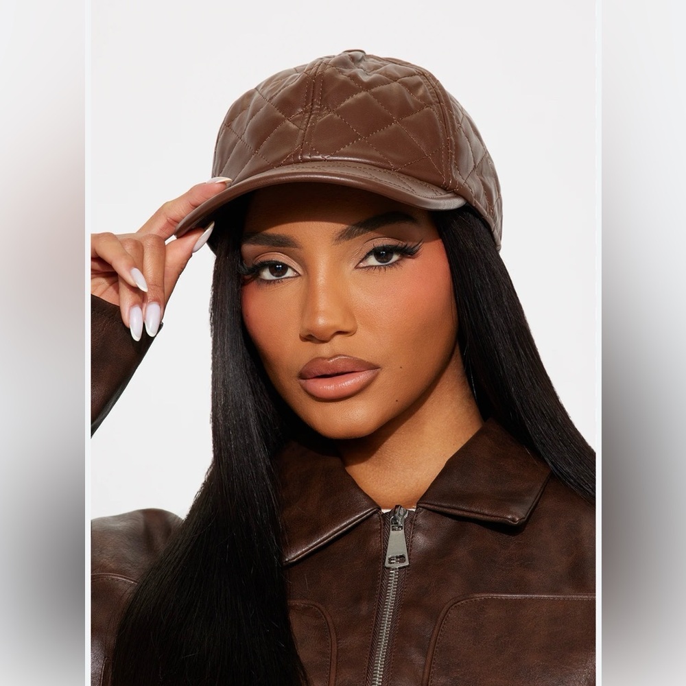 he Vince Camuto Quilted Faux Vegan Leather Baseball Cap in chocolate
